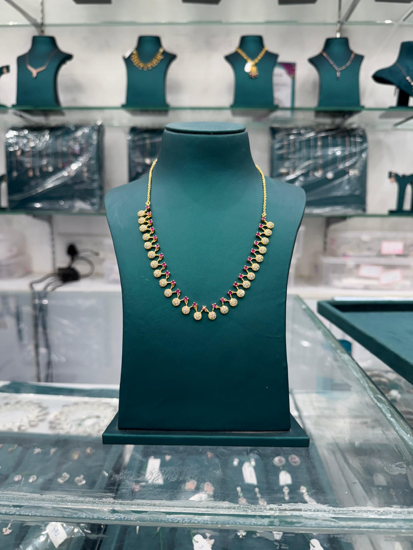 Elegant Gold finish Necklace with look-alike Rubies and Diamonds