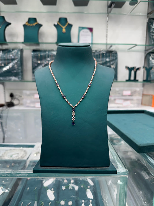 Butterfly motifs and teardrop-shaped blue sapphires look -alike