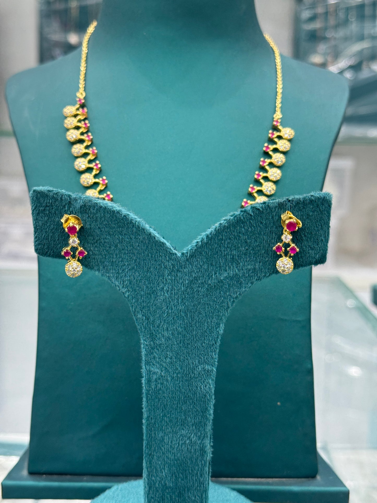 Elegant Gold finish Necklace with look-alike Rubies and Diamonds