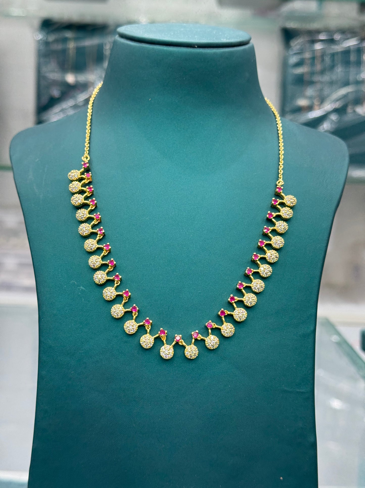 Elegant Gold finish Necklace with look-alike Rubies and Diamonds