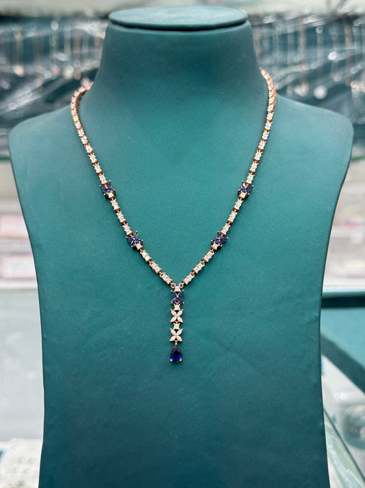 Butterfly motifs and teardrop-shaped blue sapphires look -alike