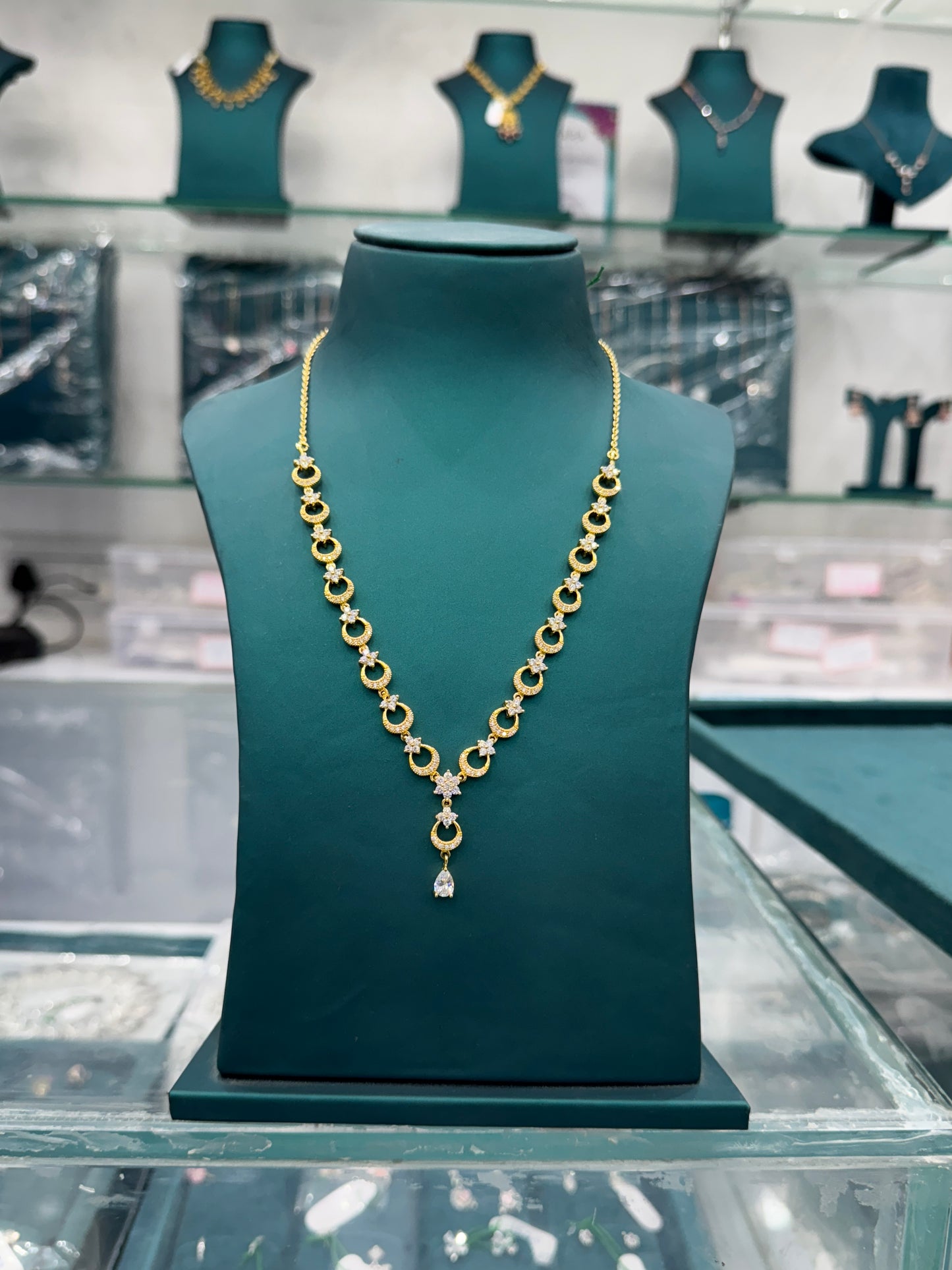 Moon and Star 925 Sterling Silver Necklace with Gold finish.
